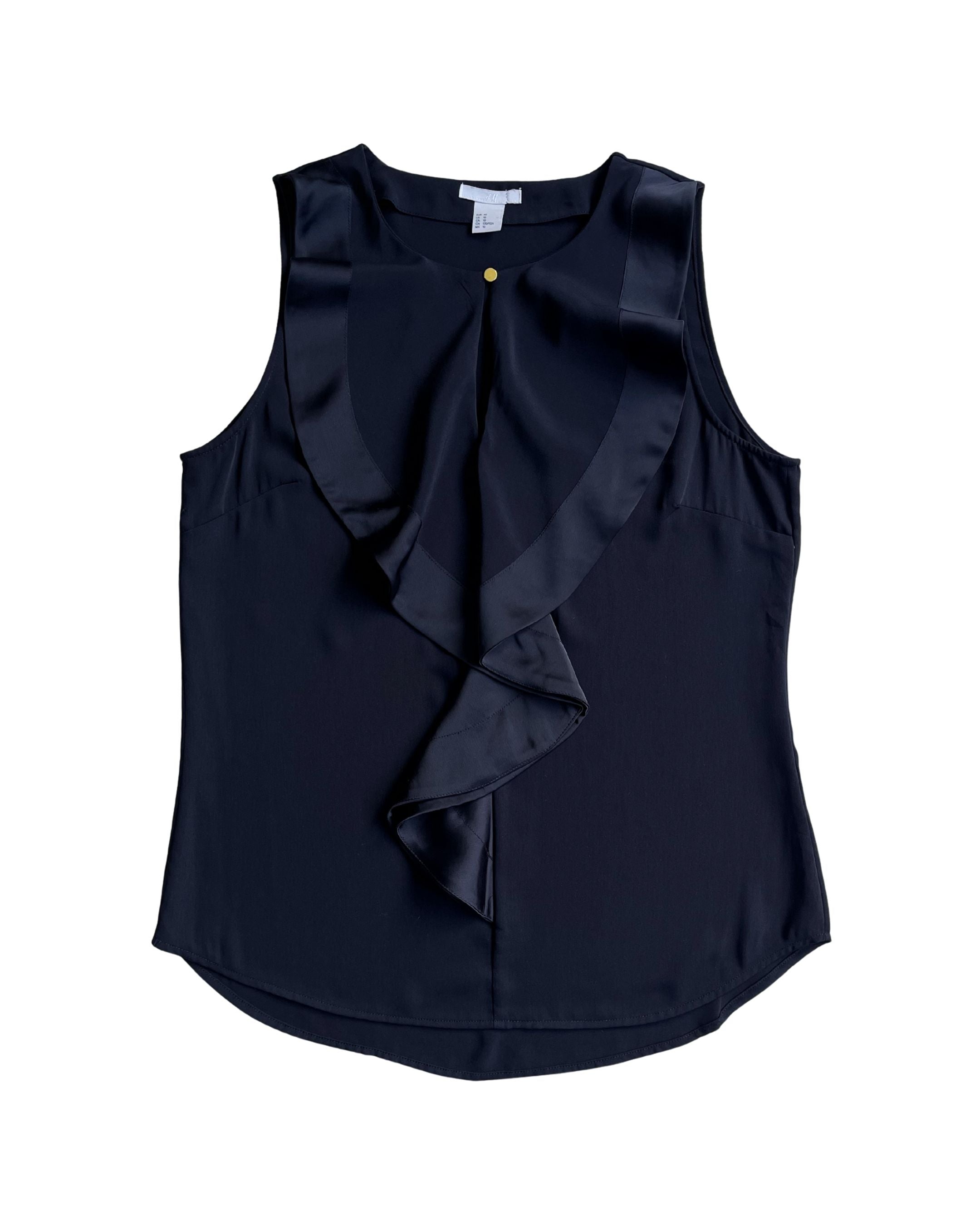 Blusa con vuelos H&M