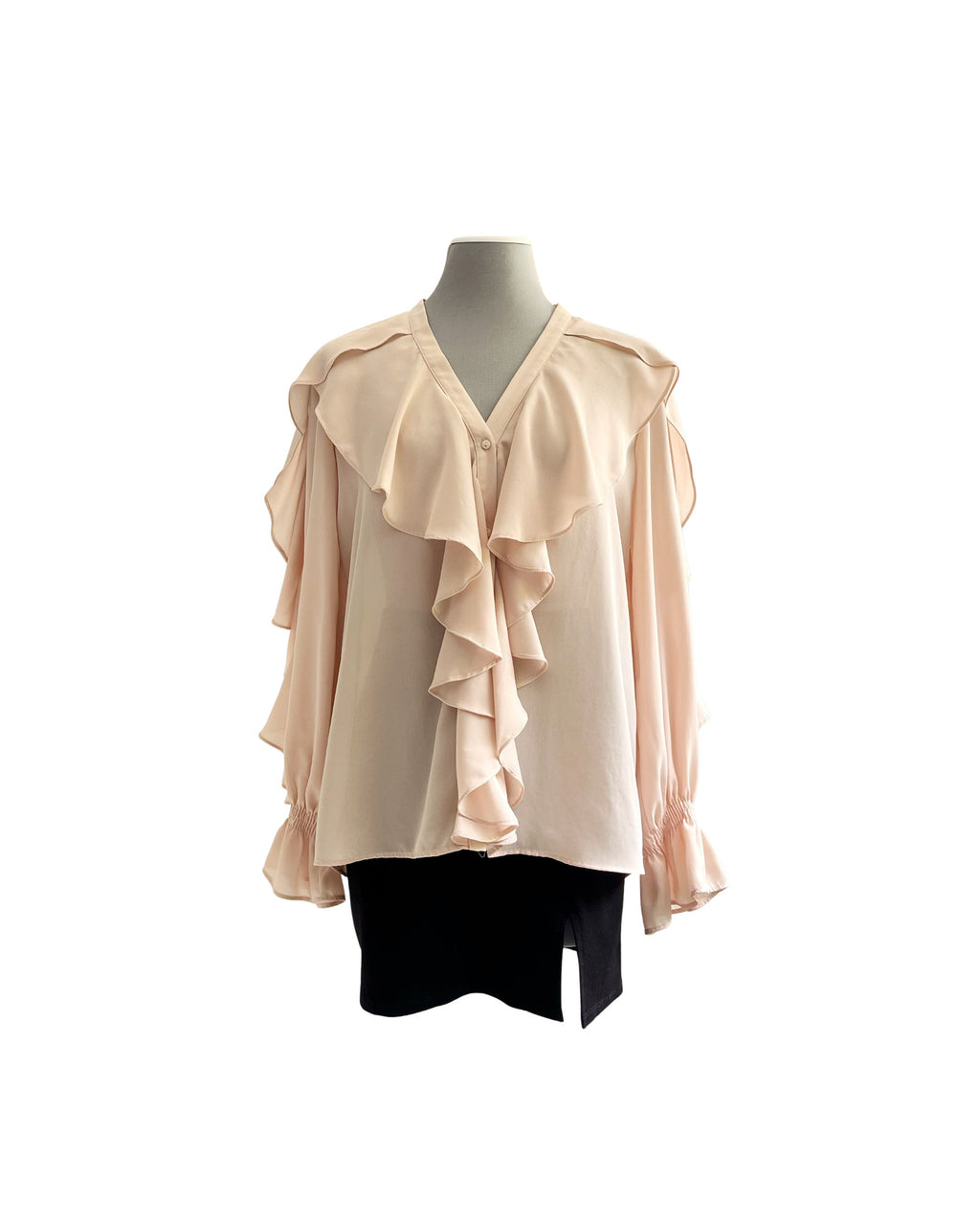 Blusa con olanes Zara