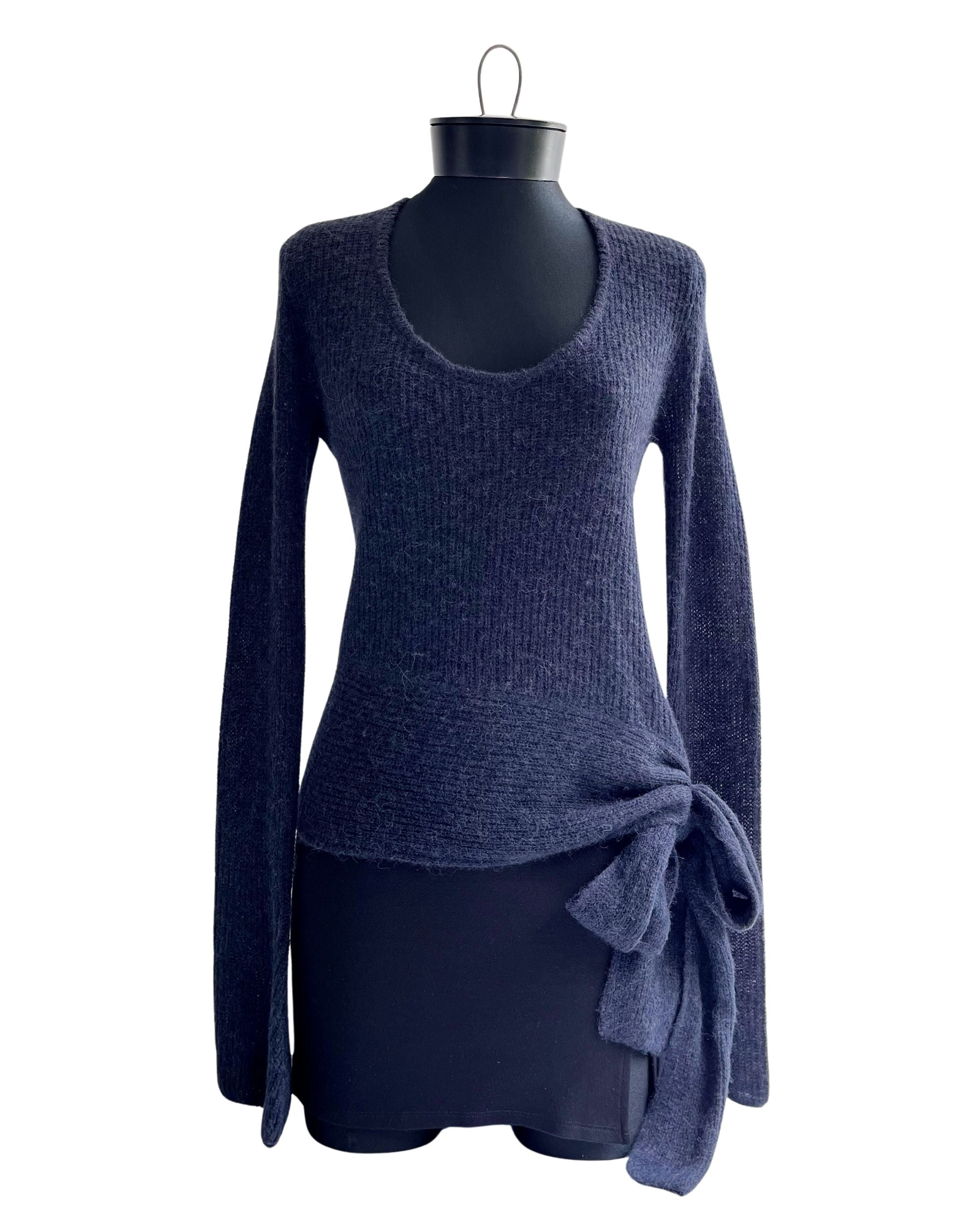 Sweater con lazo lateral Zara