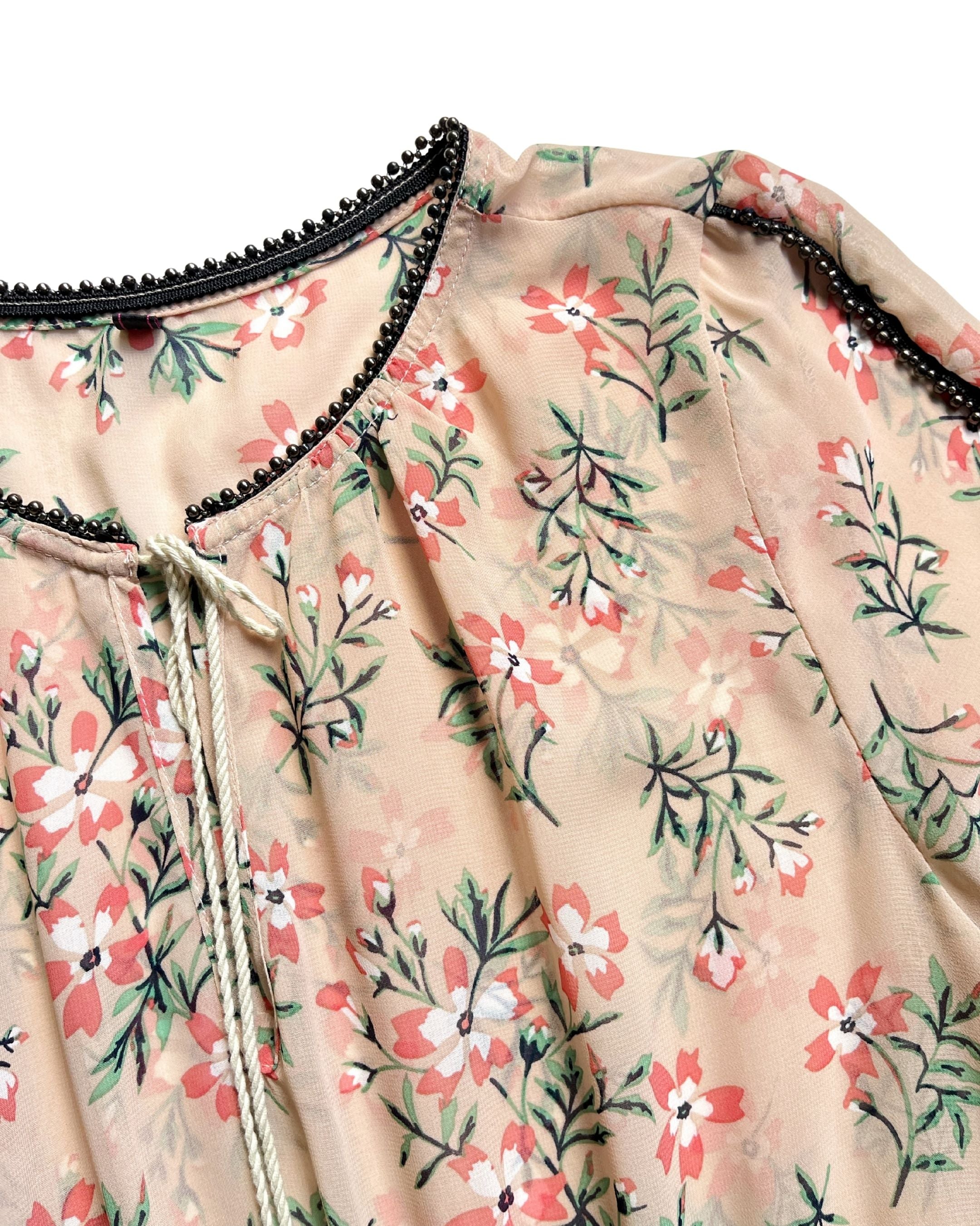 Vestido estampado con cuentas